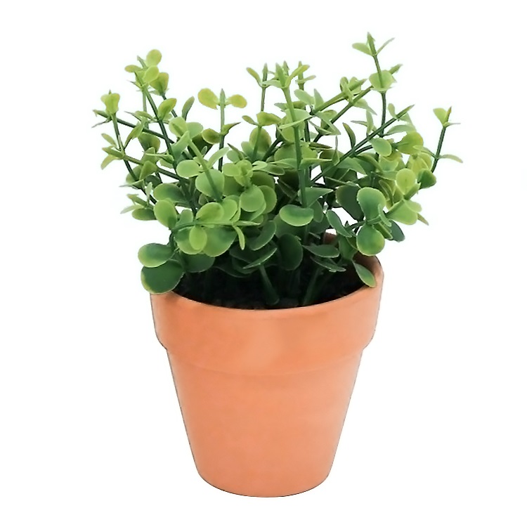 中国便宜的人造植物草人工盆栽草在室内或室外的陶瓷花盆中作装饰